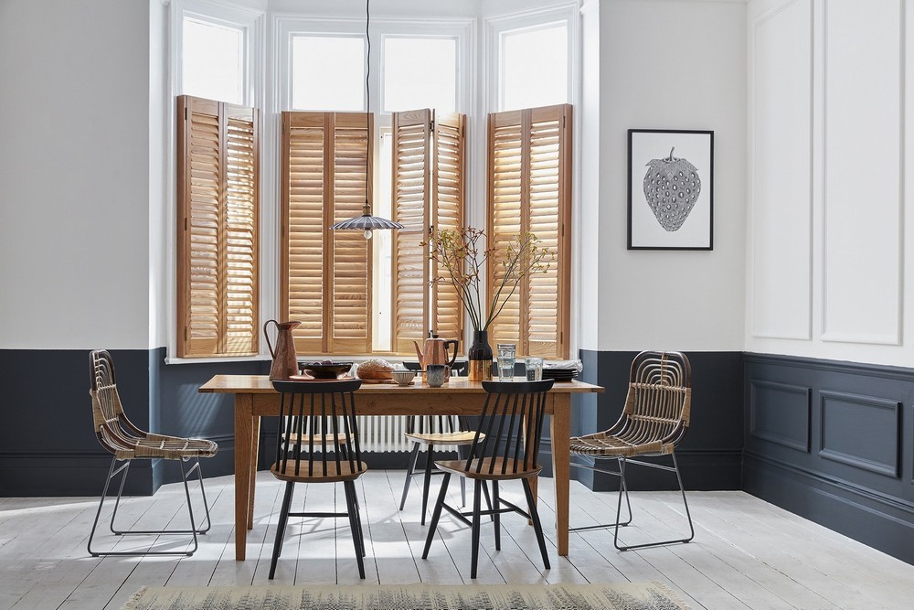 white wood shutters in spacious living area