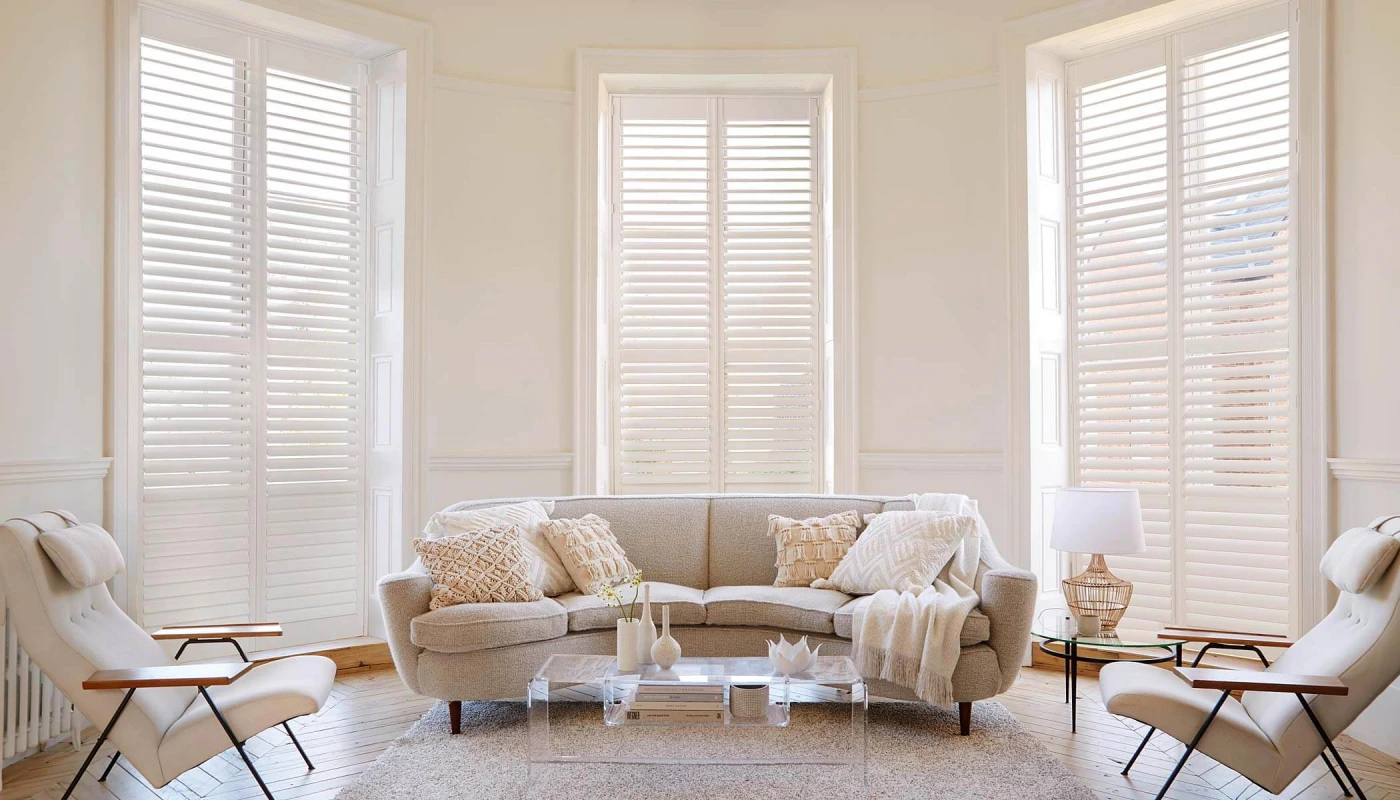 white wood shutters in spacious living area